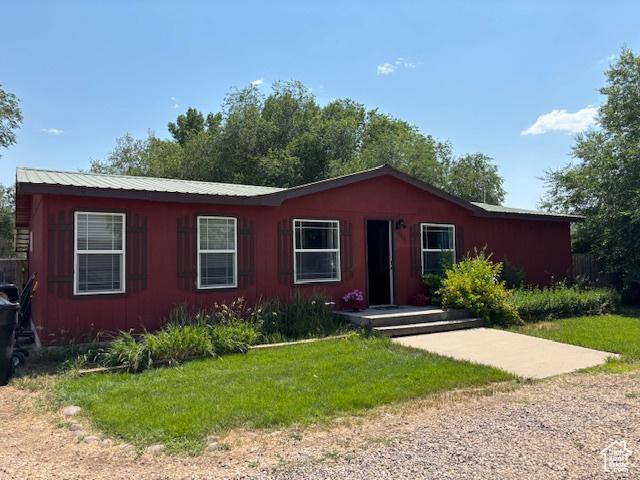 290 E 800 S, Roosevelt, UT 84066 - ranch-style house with a front lawn