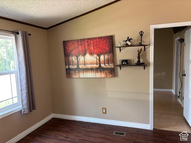 290 E 800 S, Roosevelt, UT 84066 - empty room with crown molding, wood finished floors, and a textured ceiling