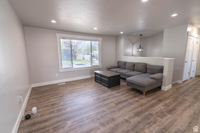 9446 S Barium St E, Sandy, UT 84094 - living area featuring recessed lighting and wood finished floors