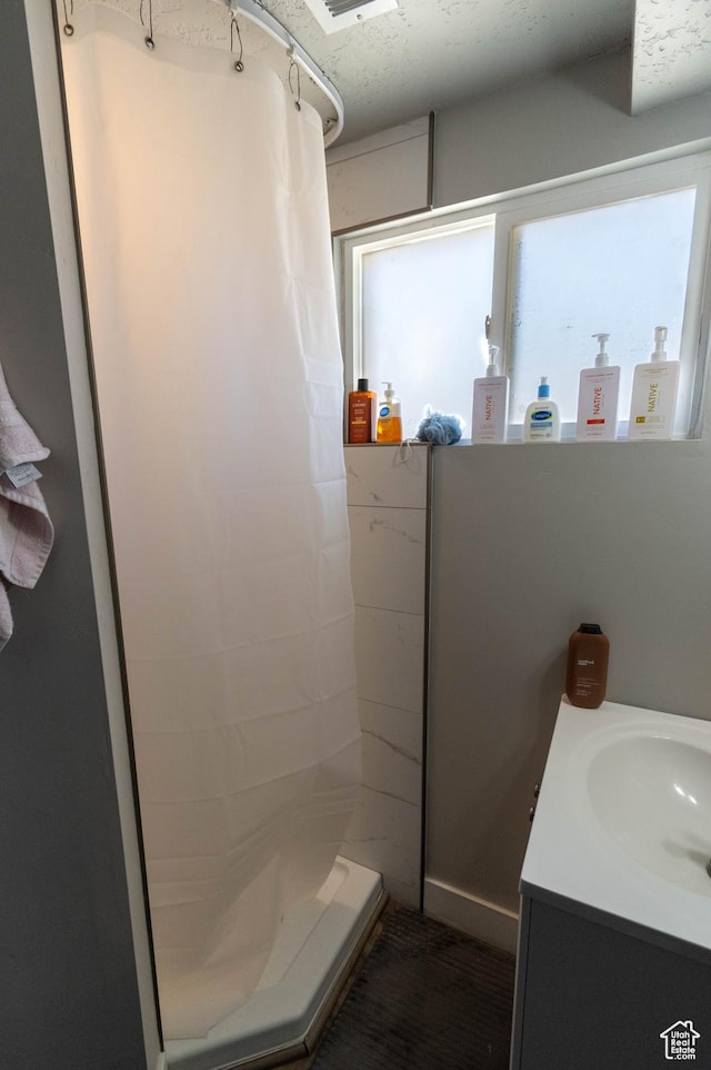 9446 S Barium St E, Sandy, UT 84094 - bathroom with a shower stall and vanity