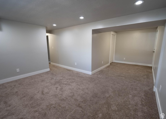9446 S Barium St E, Sandy, UT 84094 - finished basement with recessed lighting and carpet floors
