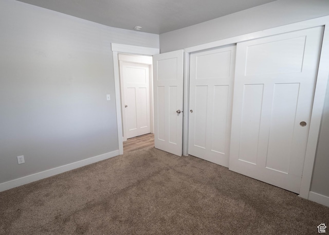 9446 S Barium St E, Sandy, UT 84094 - unfurnished bedroom with carpet and a closet