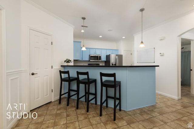 1183 N Canyon Meadow Dr E Unit 9, Provo, UT 84606 - kitchen with stainless steel appliances, stone finish floors, ornamental molding, dark countertops, and arched walkways