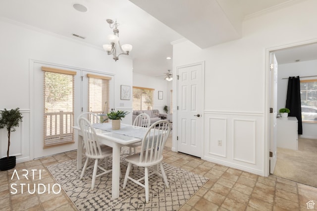 1183 N Canyon Meadow Dr E Unit 9, Provo, UT 84606 - dining room featuring crown molding, light stone finish floors, a chandelier, and ceiling fan