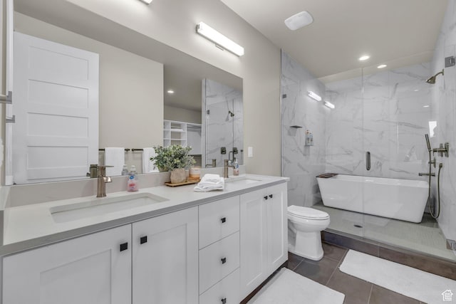 864 W Eland Cir, Heber City, UT 84032 - full bath with double vanity, a marble finish shower, a freestanding bath, tile patterned flooring, and recessed lighting