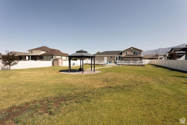 1285 W 1100 N, Farr West, UT 84404 - fenced backyard with a gazebo and a storage unit
