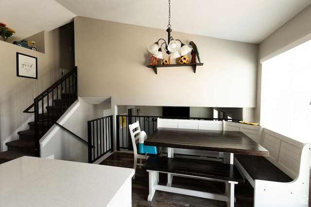 1285 W 1100 N, Farr West, UT 84404 - dining area featuring a chandelier, dark wood finished floors, stairway, and vaulted ceiling