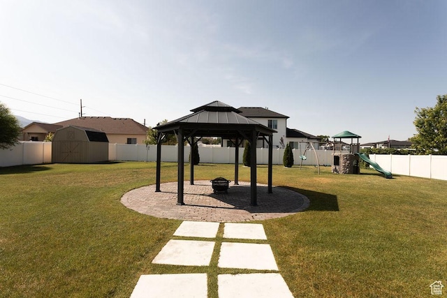 1285 W 1100 N, Farr West, UT 84404 - fenced backyard featuring a storage shed, a gazebo, and a patio area