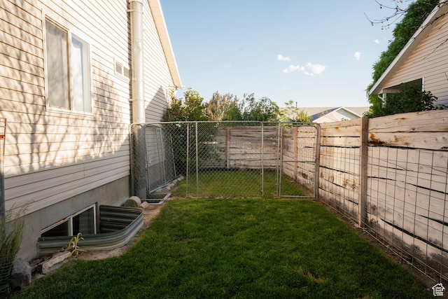 2087 E Weeping Willow Way N, Eagle Mountain, UT 84005 - fenced backyard with a gate