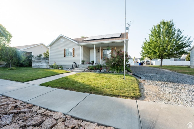 2087 E Weeping Willow Way N, Eagle Mountain, UT 84005 - single story home featuring roof mounted solar panels and covered porch