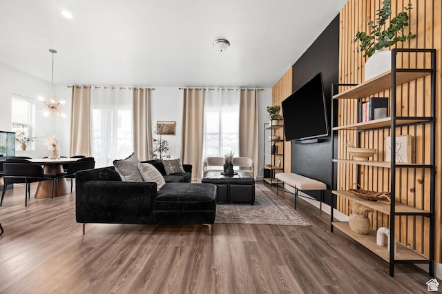 4753 W Mossley Dr, Herriman, UT 84096 - living area with wood finished floors and a chandelier