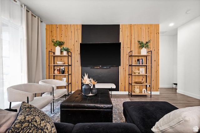 4753 W Mossley Dr, Herriman, UT 84096 - living room with wood finished floors, built in features, and recessed lighting