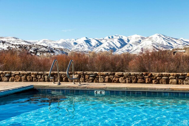 7615 E Stardust Ct Unit 319H, Heber City, UT 84032 - community pool featuring a mountain view