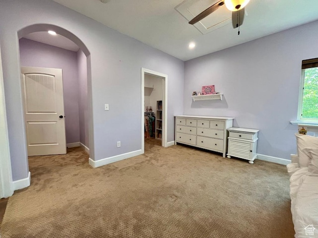 12768 S Whisper Bend Dr E, Draper, UT 84020 - bedroom featuring arched walkways, carpet, a spacious closet, a ceiling fan, and recessed lighting
