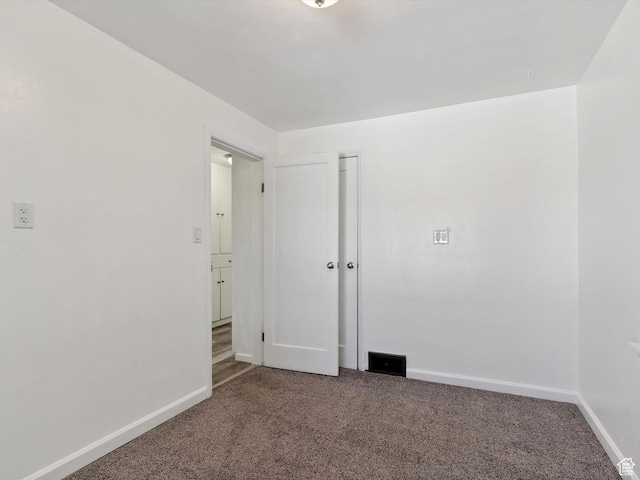 1425 E 22nd St S, Ogden, UT 84401 - carpeted empty room with baseboards