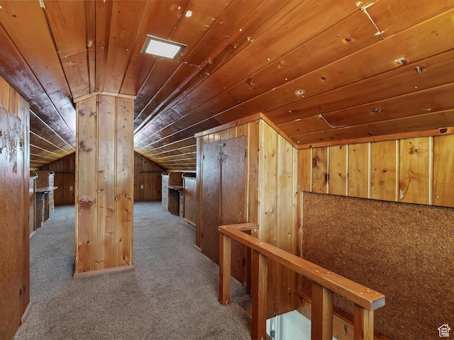 1425 E 22nd St S, Ogden, UT 84401 - hallway featuring wood ceiling, an upstairs landing, lofted ceiling, carpet, and wood walls