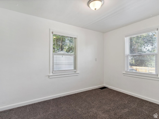 1425 E 22nd St S, Ogden, UT 84401 - unfurnished room featuring carpet and plenty of natural light