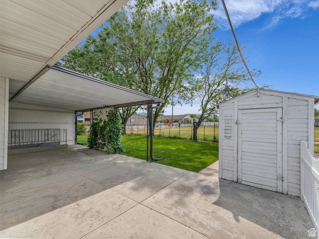 12580 S Janice Dr, Riverton, UT 84065 - view of patio / terrace with a shed and a carport