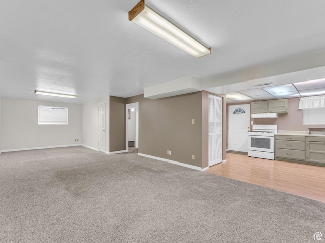 12580 S Janice Dr, Riverton, UT 84065 - unfurnished living room with light colored carpet and baseboards
