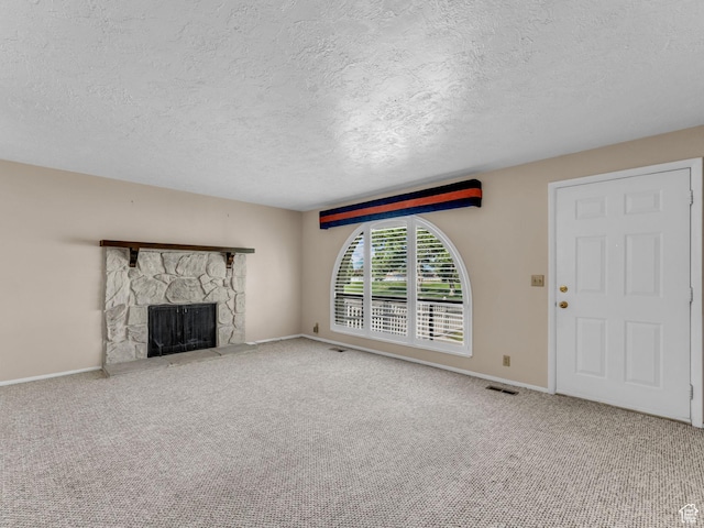 12580 S Janice Dr, Riverton, UT 84065 - unfurnished living room with a textured ceiling, carpet, and a fireplace