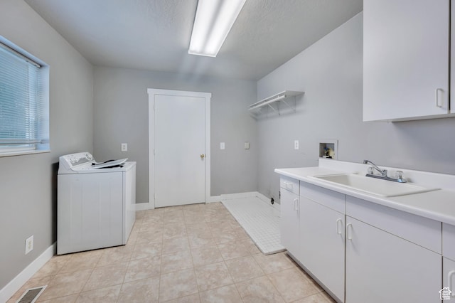 4940 S Atwood Blvd, Murray, UT 84107 - washroom featuring cabinet space, light tile patterned floors, and washer hookup