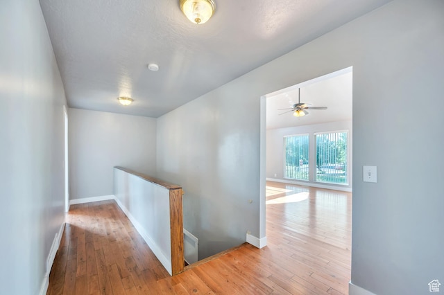 4940 S Atwood Blvd, Murray, UT 84107 - hall with an upstairs landing and wood-type flooring