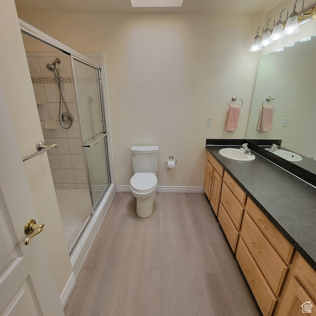 5272 S 1035 E, South Ogden, UT 84403 - full bath with wood finished floors, vanity, and a stall shower