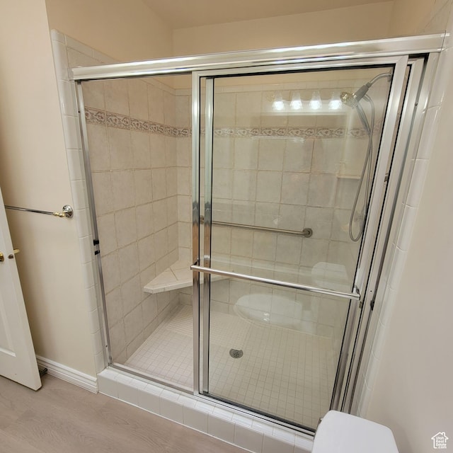5272 S 1035 E, South Ogden, UT 84403 - bathroom featuring a shower stall and wood finished floors
