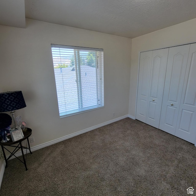 5272 S 1035 E, South Ogden, UT 84403 - unfurnished bedroom featuring carpet flooring and a closet