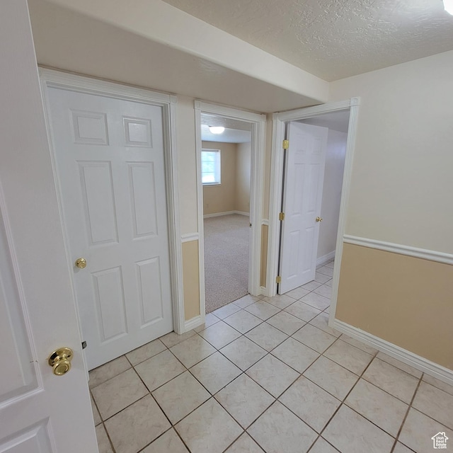 5272 S 1035 E, South Ogden, UT 84403 - spare room featuring light tile patterned floors and a textured ceiling