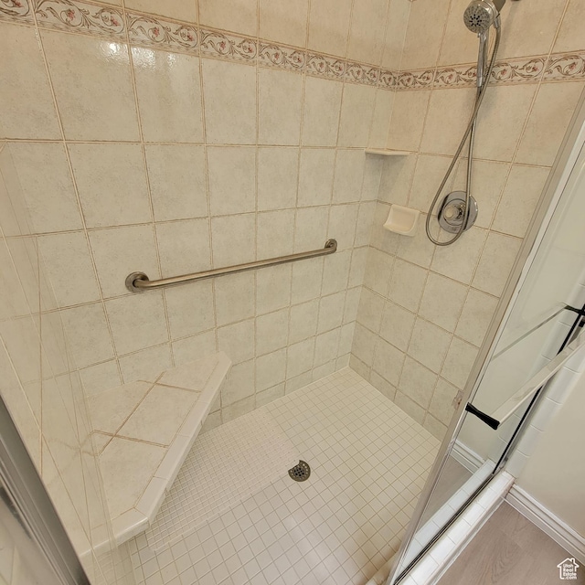 5272 S 1035 E, South Ogden, UT 84403 - full bathroom featuring a tile shower and wood finished floors