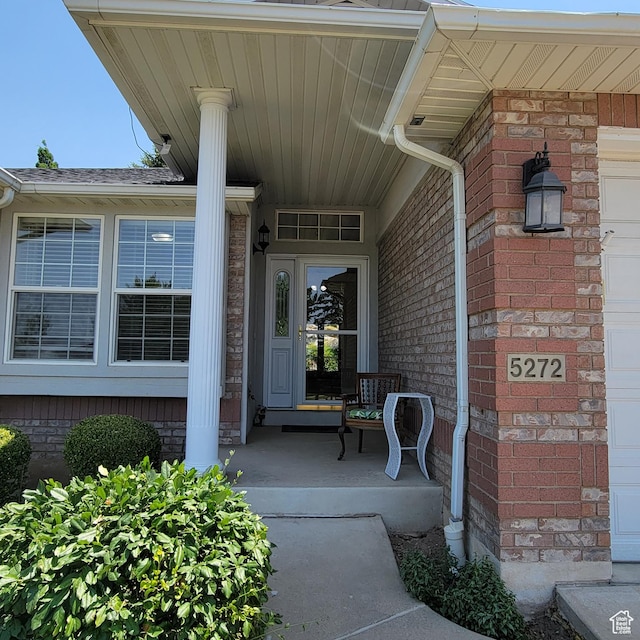 5272 S 1035 E, South Ogden, UT 84403 - entrance to property featuring brick siding and covered porch
