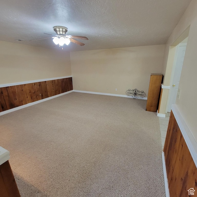 5272 S 1035 E, South Ogden, UT 84403 - spare room with a ceiling fan, light colored carpet, and a textured ceiling