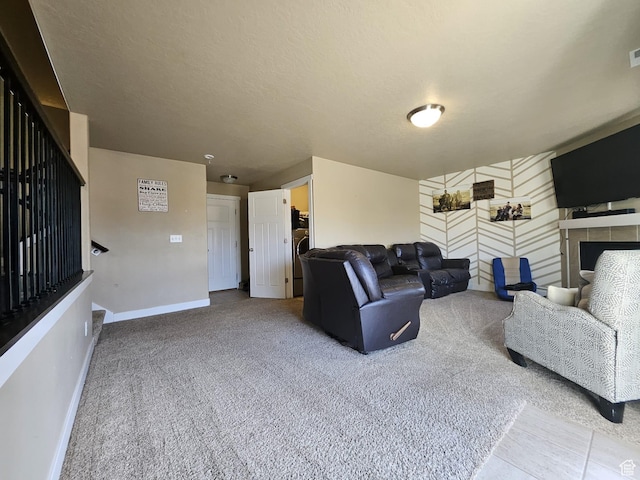 2175 E 1000 N, Ballard, UT 84066 - carpeted living room featuring baseboards and a fireplace