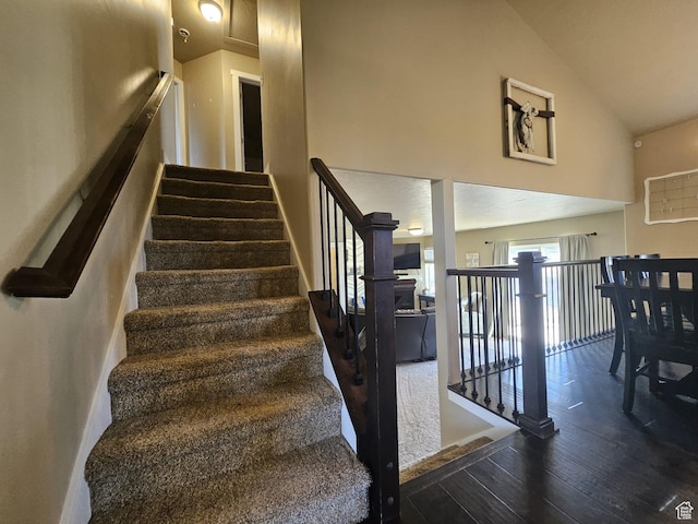 2175 E 1000 N, Ballard, UT 84066 - staircase featuring hardwood / wood-style flooring and high vaulted ceiling
