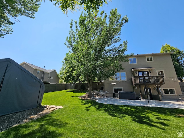 3501 E Golden Eagle Rd N, Eagle Mountain, UT 84005 - view of yard with a patio and a hot tub