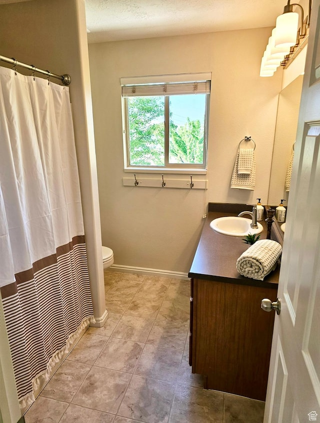 3501 E Golden Eagle Rd N, Eagle Mountain, UT 84005 - full bath with vanity, tile patterned floors, and a shower with curtain