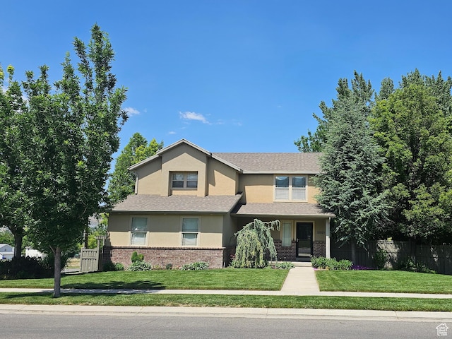 3501 E Golden Eagle Rd N, Eagle Mountain, UT 84005 - view of front of property featuring brick siding and stucco siding