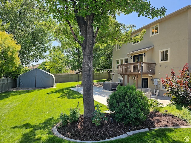 3501 E Golden Eagle Rd N, Eagle Mountain, UT 84005 - fenced backyard with a patio and a hot tub