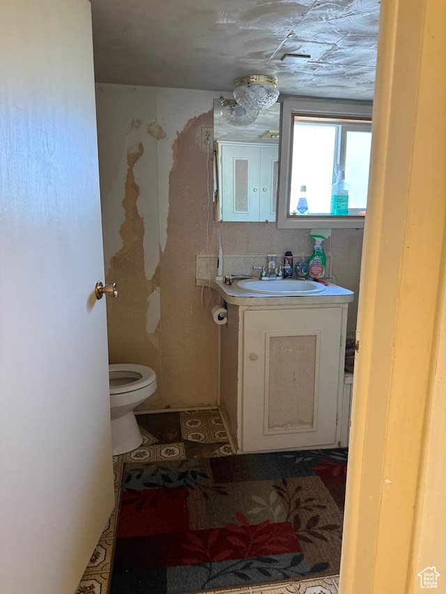 539 E Center St, Pleasant Grove, UT 84062 - half bathroom featuring toilet and vanity