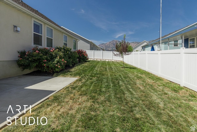 1608 N 500 E, North Ogden, UT 84404 - fenced backyard with a mountain view and a patio