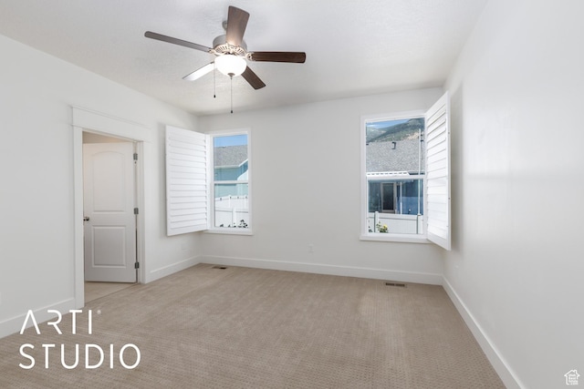 1608 N 500 E, North Ogden, UT 84404 - empty room featuring carpet flooring, plenty of natural light, and ceiling fan
