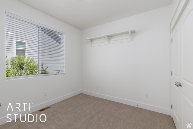 1608 N 500 E, North Ogden, UT 84404 - unfurnished room with light colored carpet and baseboards