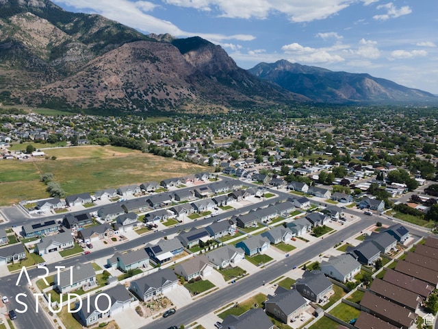 1608 N 500 E, North Ogden, UT 84404 - aerial view of property and surrounding area featuring mountains and nearby suburban area