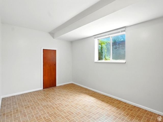3992 S 4665 W, West Valley City, UT 84120 - spare room featuring brick patterned floors and baseboards