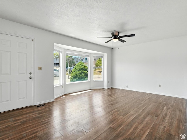 3992 S 4665 W, West Valley City, UT 84120 - unfurnished living room with ceiling fan and dark wood-type flooring