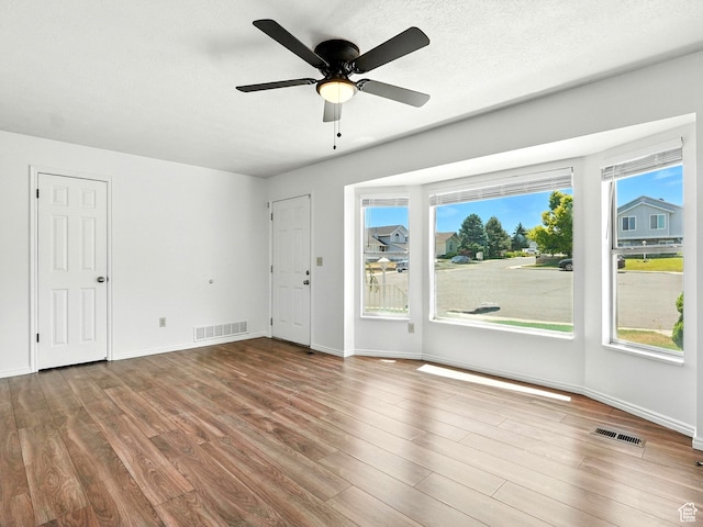 3992 S 4665 W, West Valley City, UT 84120 - spare room with wood finished floors and ceiling fan
