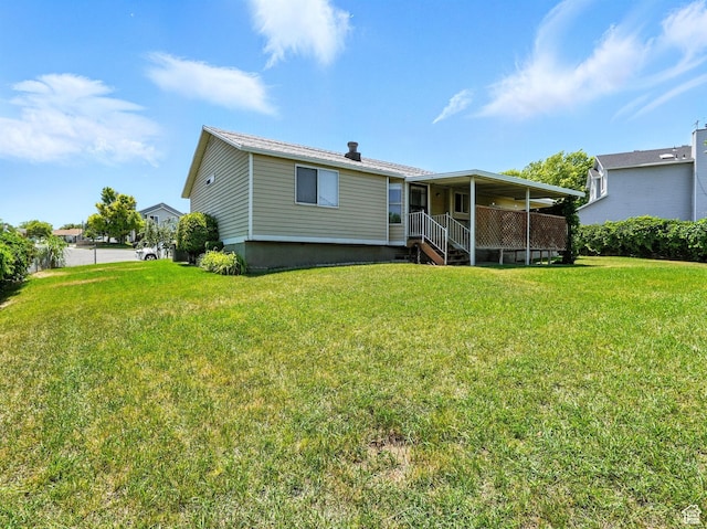 3992 S 4665 W, West Valley City, UT 84120 - back of house featuring a lawn