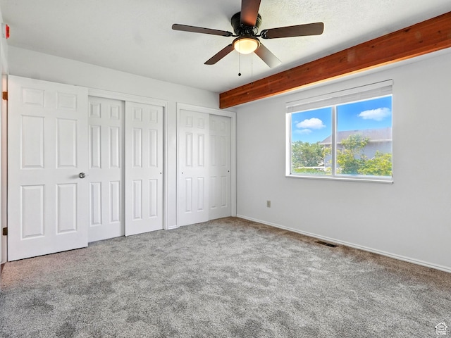 3992 S 4665 W, West Valley City, UT 84120 - unfurnished bedroom with two closets, carpet, and ceiling fan