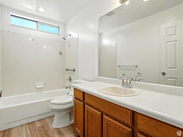 3992 S 4665 W, West Valley City, UT 84120 - full bathroom featuring wood finished floors, vanity, and  shower combination